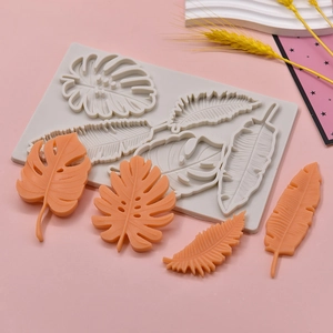 Tropical leaf silicone mold with monstera and fern designs for DIY cake decorating