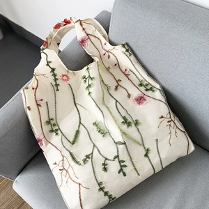 Borsa tote in tela ricamata con motivi floreali per spiaggia e viaggi in stile artistico