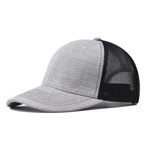 Close-up of grey curved brim baseball cap with breathable black mesh back and texture
