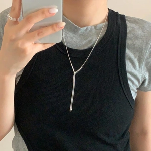 Mirror selfie showing the Y-shaped 925 sterling silver beaded necklace for women