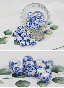 Macro shot of blue and white orchid porcelain beads with large holes and size reference