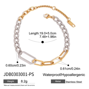 Detail view of two-tone gold and silver chunky link chain bracelet with dimension labels