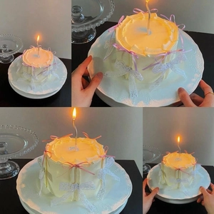 Décoration de gâteau style ballet avec rubans roses et nœuds en dentelle blanche