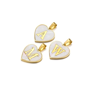 Golden heart pendants with white pearl shell inlay featuring letters A, M, and W