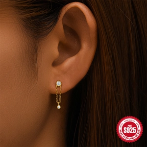 S925 sterling silver gold chain stud earrings with diamond accents worn by a model