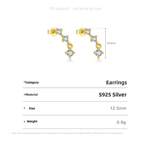 Macro detail of S925 sterling silver curved earrings with brilliant zircon stones