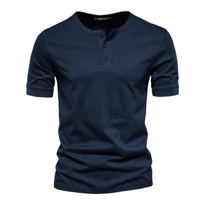 Detail of navy blue knit fabric and three-button neckline on a slim fit Henley shirt
