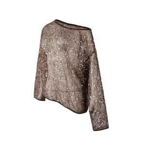 Close-up of bronze sequin mesh top featuring hollow knit texture and shimmering finish