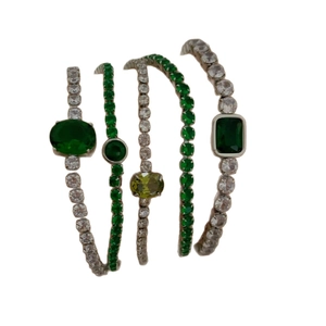 Multi-layer silver stainless steel bracelet set with green zircon stones on white background