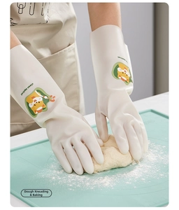 Close-up of cream rubber kitchen gloves with anti-slip grip used for kneading dough