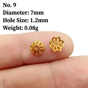 Detail of 7mm hollow flower bead cap in gold finish for DIY jewelry making