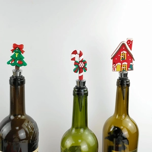Christmas wine bottle stoppers featuring Santa tree and candy cane silicone designs