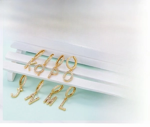 Detail display of alphabet hoop earrings J-Q with cubic zirconia in platinum plating