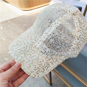 Beige baseball cap with sparkly sequins and breathable mesh panels for a chic look