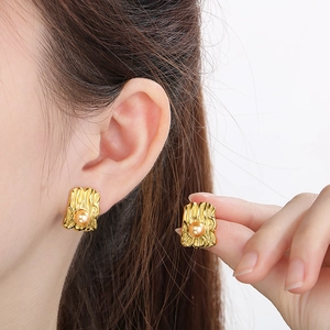 Irregular gold textured square earrings with shell pearls in minimalist chic style
