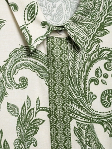Detail of printed long sleeve shirt showing paisley patterns and linen texture