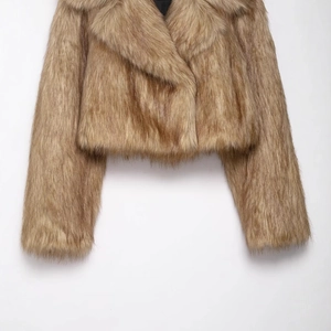 Fashionable tan faux fur short jacket with oversized lapel collar for women
