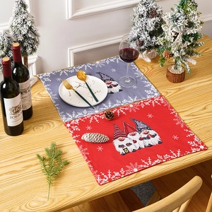 Christmas gnome placemats set in red and grey colors for holiday dining table decor
