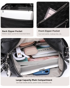 Details des Innenraums eines schwarzen Lederrucksacks mit praktischen Fachaufteilungen