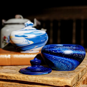 Artistic teapot shaped silicone mold storage box with blue marble resin finish and starry patterns