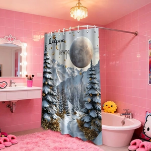 Detail of winter snow scene print on shower curtain with silver metal ring hooks