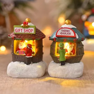 Miniature resin Christmas gift shop house with LED lights and Santa figurines