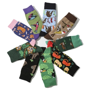 Tropical animal pattern cotton crew socks featuring jaguar and hummingbird prints