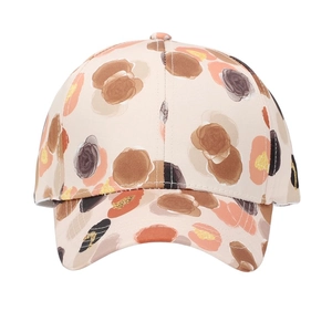 Women's baseball cap with abstract floral print in beige and warm tones for sun protection
