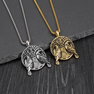 Nordic Viking raven pendant necklaces in gold and silver finish with Celtic tree of life design