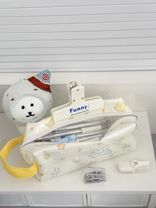 Macro view of creamy white waterproof pencil case showing large capacity and zipper