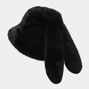 Close-up of black faux fur bucket hat featuring long bunny ears for winter warmth