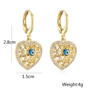 Detail view of 2.8cm gold heart earrings with zircon evil eye and size markings