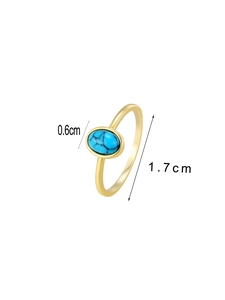 Detailed view of bohemian gold ring showing oval turquoise stone and 1.7cm size measurement