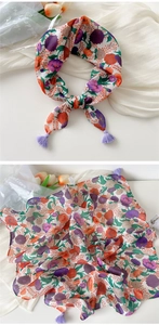 Close-up of floral print cotton linen square scarf featuring elegant purple corner tassels