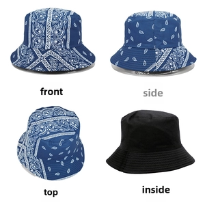 Detail view of the blue paisley bandana bucket hat showing front, side, top, and lining