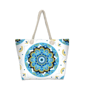 Large capacity beach tote bag with blue evil eye mandala pattern and rope handles