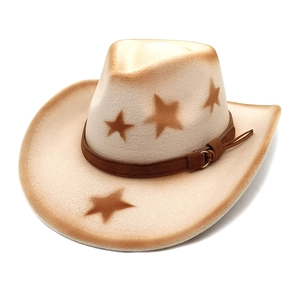 Detail of beige felt western cowboy hat with star patterns and brown faux leather band