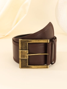 Close-up of brown leather belt with vintage bronze square buckle and stitched detail