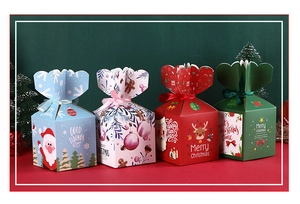 Set of four colorful Christmas gift boxes with festive holiday greetings and patterns