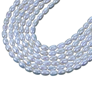 Lustrous 4-4.5mm natural freshwater rice pearls in elegant white strands for DIY jewelry