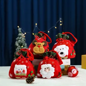 Set of 4 Christmas drawstring gift bags with Santa, snowman, elk and bear designs