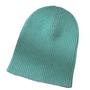 Minimalist mint green ribbed knit beanie hat for winter warmth and cozy outdoor style