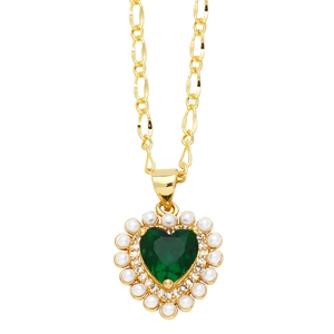Elegant gold necklace with a heart-shaped green gemstone pendant and pearl border