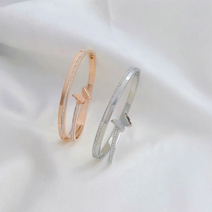 Bracelets papillon luxe en acier inoxydable avec cristaux en or rose et argent