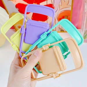 Set of 4 cute mini foldable chair phone stands in purple, yellow, green and beige colors