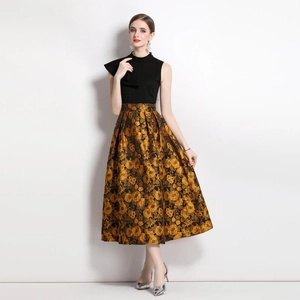 Vintage sleeveless dress with black high neck bodice and gold jacquard floral skirt