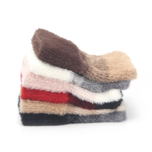 Thick plush knit fuzzy socks in various colors including beige, grey, pink, and red