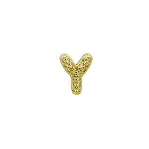 Macro shot of gold bubble letter Y pendant necklace encrusted with shimmering zircons