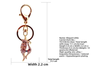 Detail view of crystal cat keychain showing dimensions and materials on white background