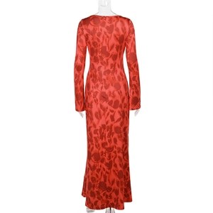 Detail view of elegant red rose print fabric on a slim fit long sleeve maxi dress